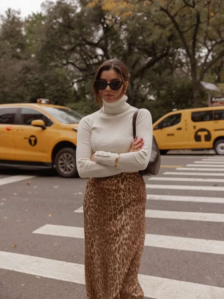 A Cream Turtleneck With a Leopard Print Satin Skirt