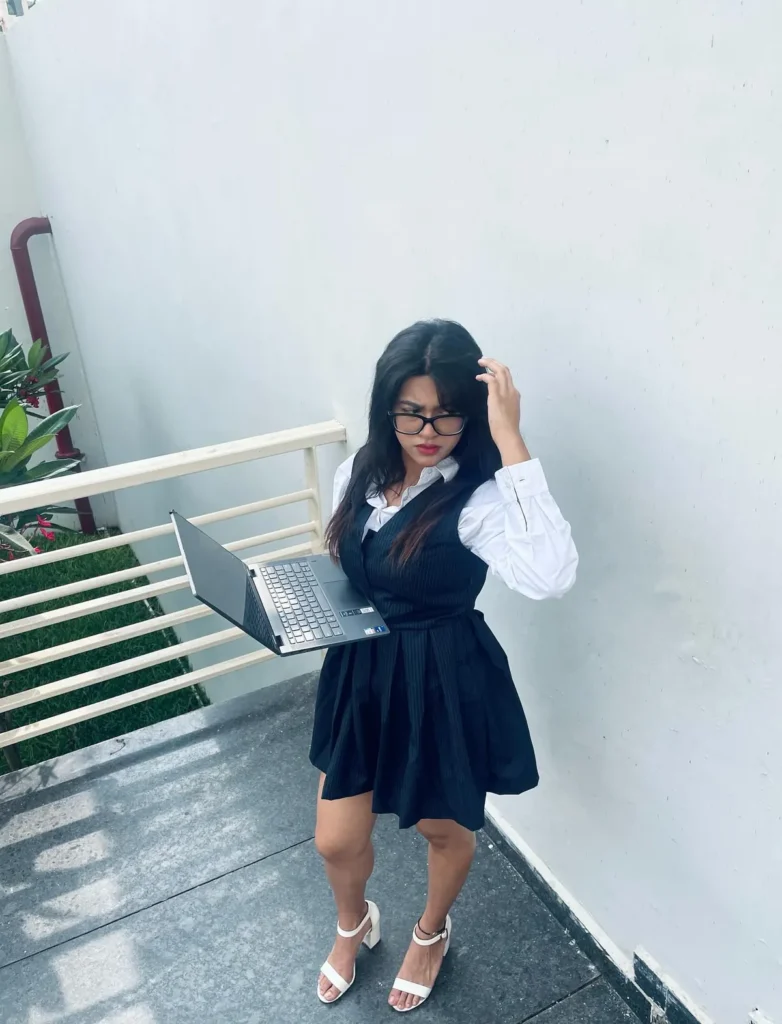 Pinstripe Pinafore Dress Over a White Shirt
