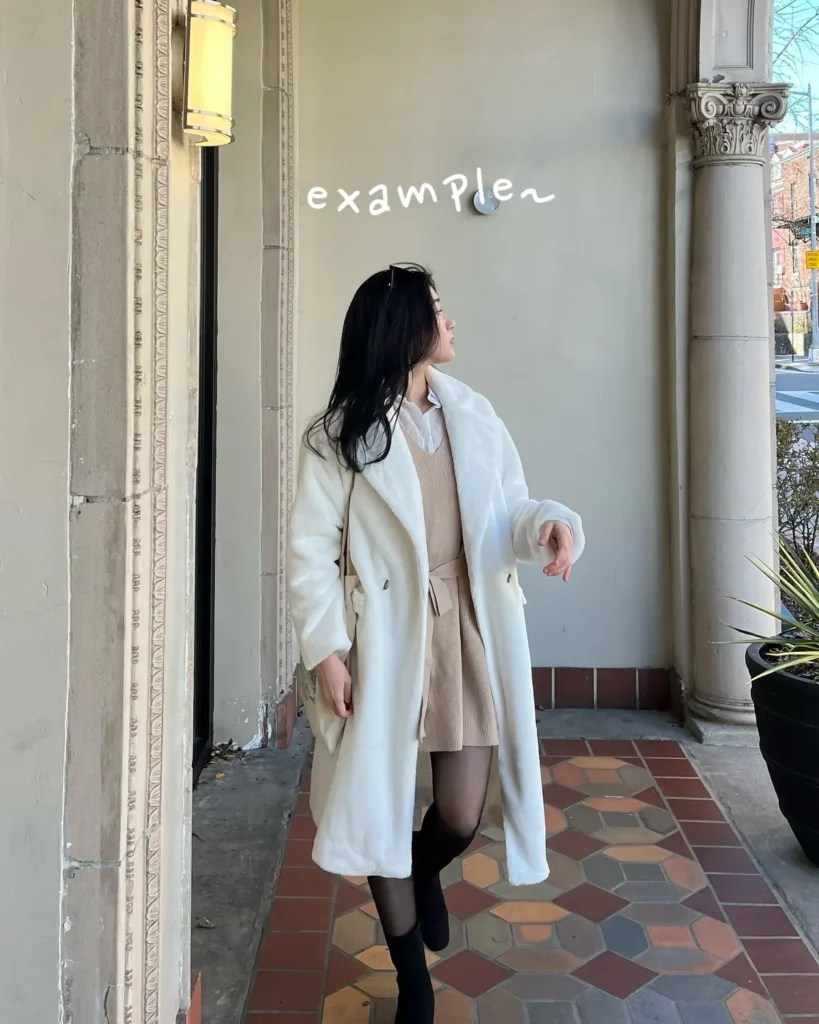 A Beige Knit Dress Layered Over a White Shirt