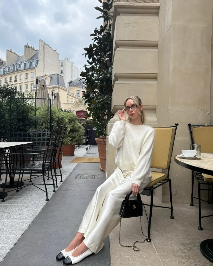A Fuzzy Cream Sweater With Satin Trousers