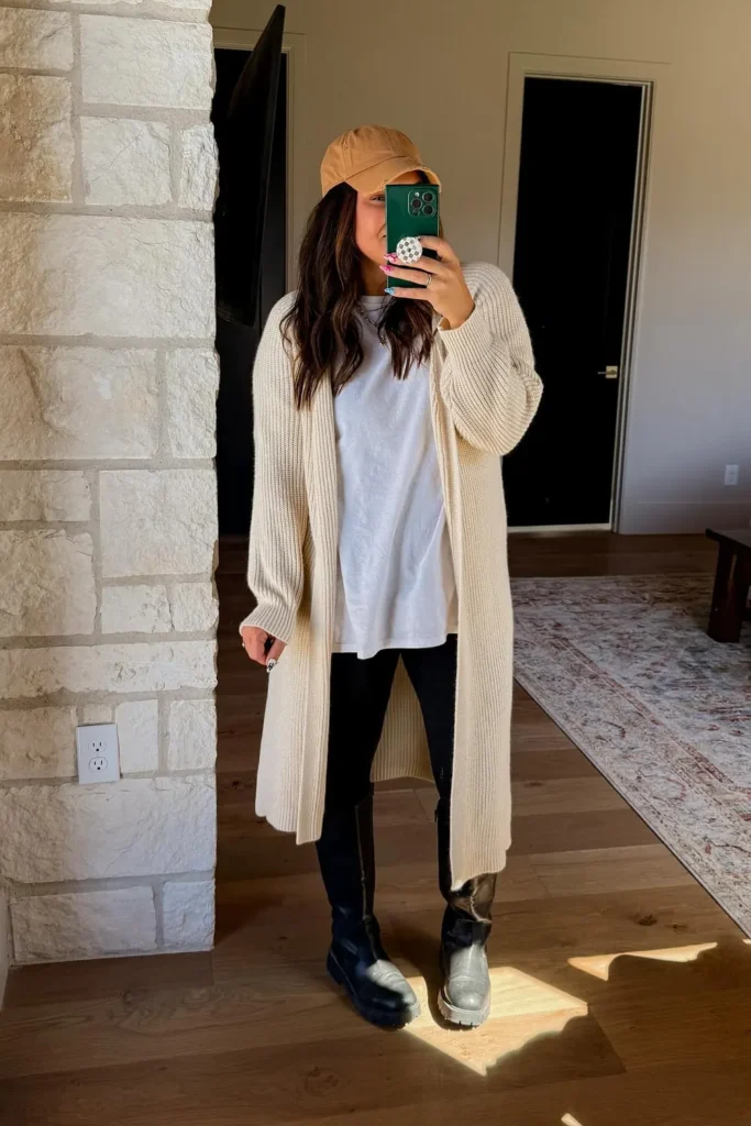 Long Cream Cardigan Over Leggings With Knee High Boots