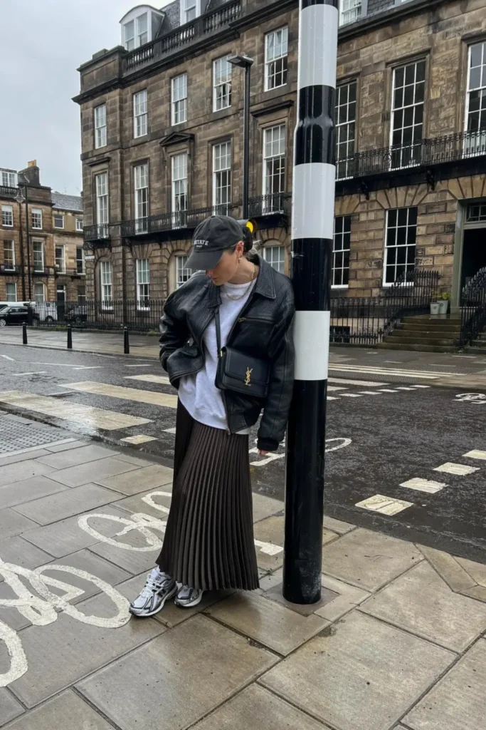Brown Pleated Maxi Skirt With a Leather Bomber Jacket