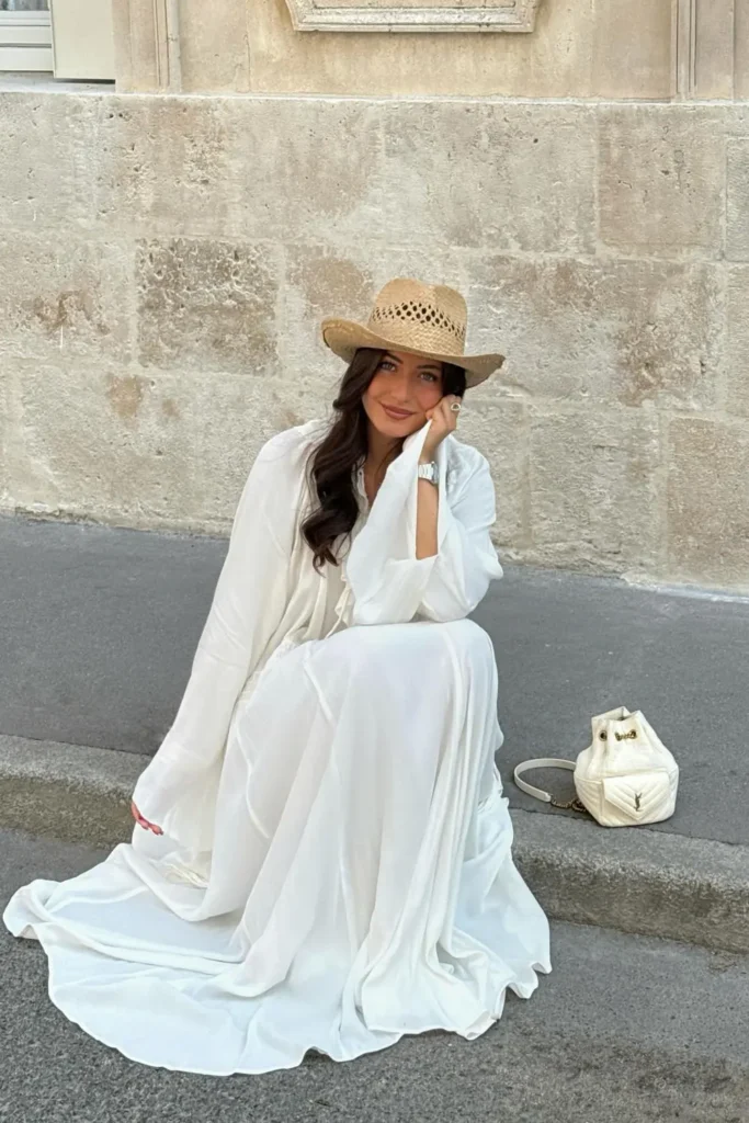 All White Flowy Maxi Dress With a Straw Hat