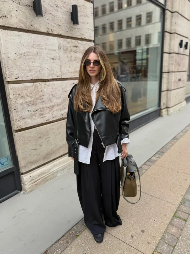 A Black Biker Jacket Over a Crinkled White Shirt