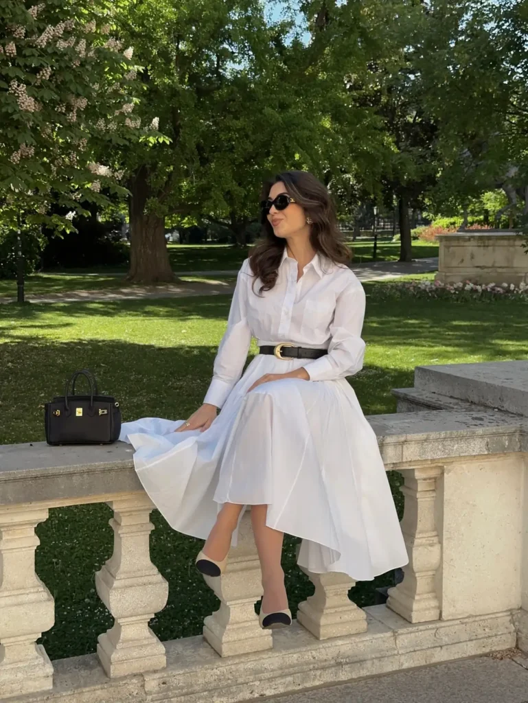 The White Shirt Dress With a Black Belt