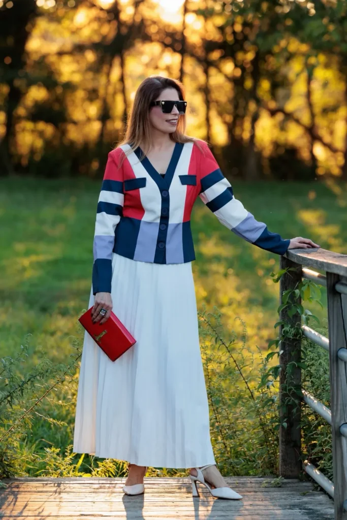 Color Block Jacket With a White Pleated Maxi Skirt