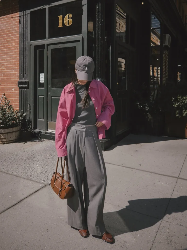 A Hot Pink Shirt Over Head to Toe Gray