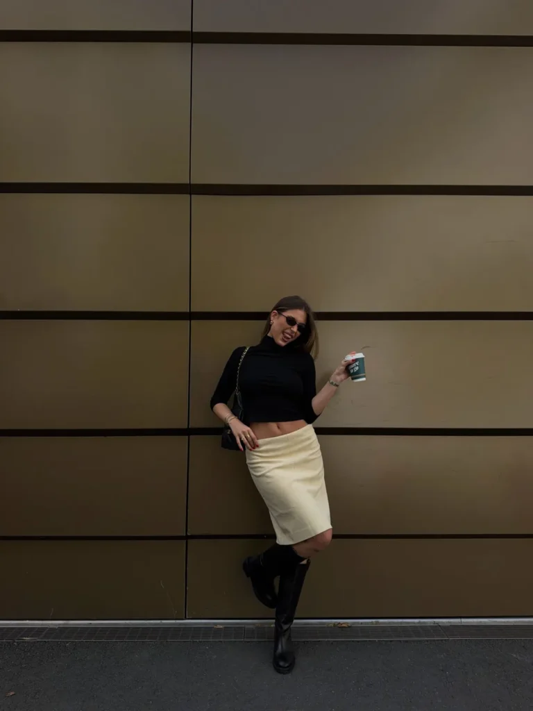 A Black Turtleneck, a Butter Yellow Skirt, and Knee High Boots