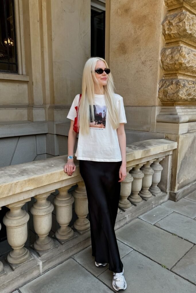 A Black Satin Maxi With a Graphic Tee and Chunky Runners