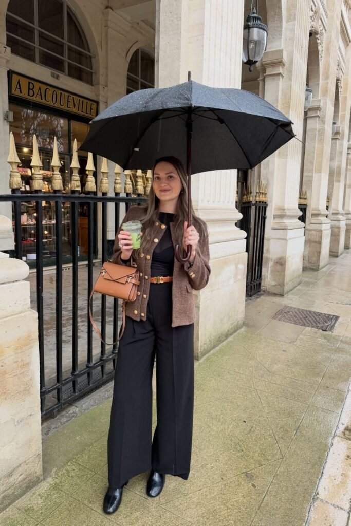 A Brown Tweed Jacket With Black Wide Leg Trousers