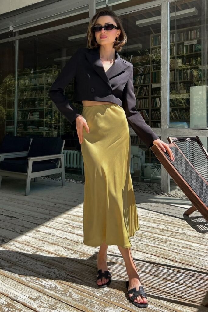 A Chartreuse Satin Midi With a Cropped Charcoal Blazer