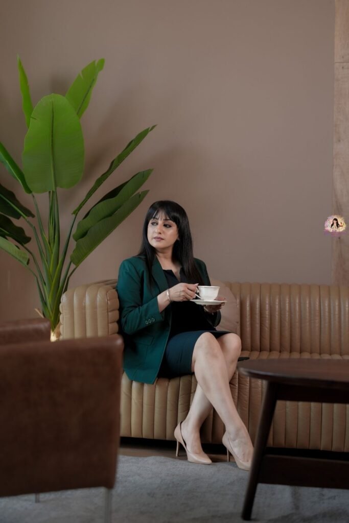 A Dark Green Blazer Over a Navy Dress