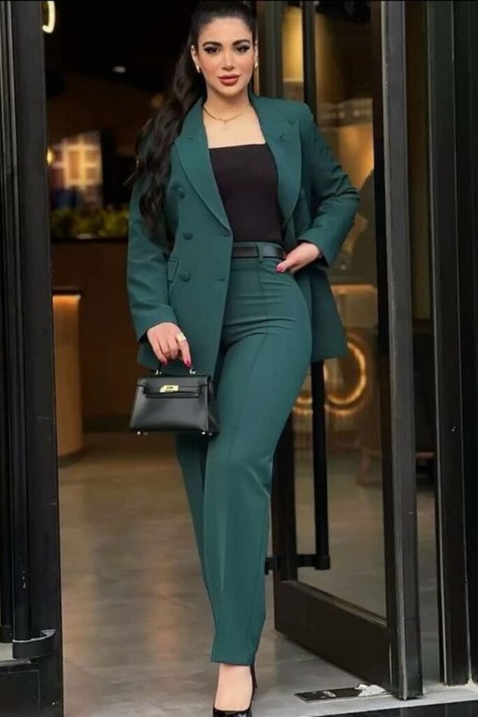 A Deep Teal Suit With a Black Top