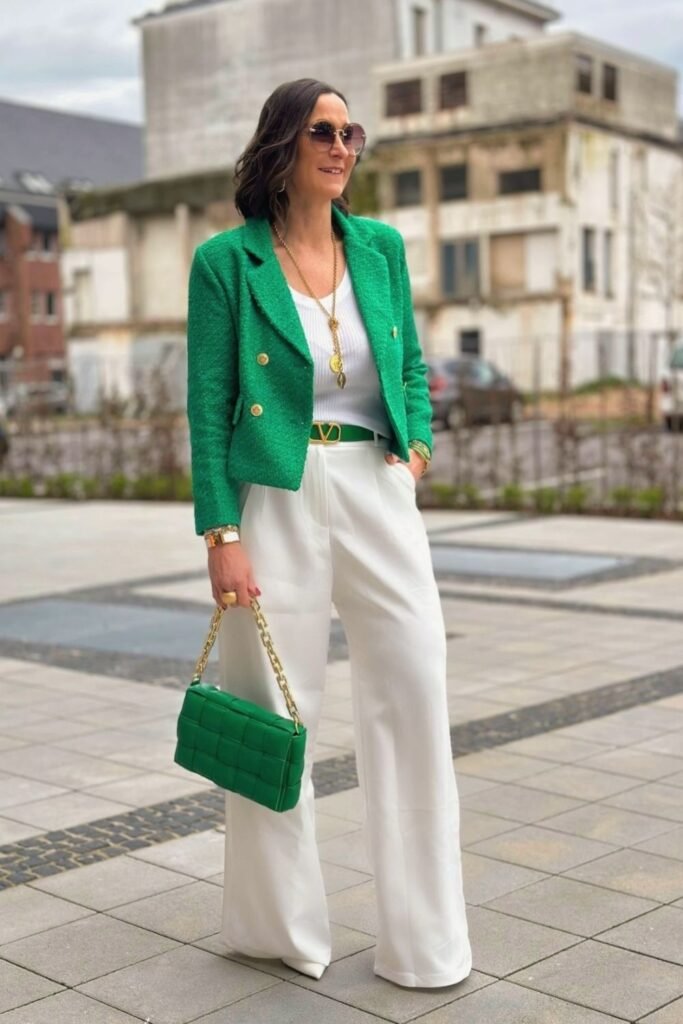 A Green Tweed Jacket With White Wide Leg Trousers