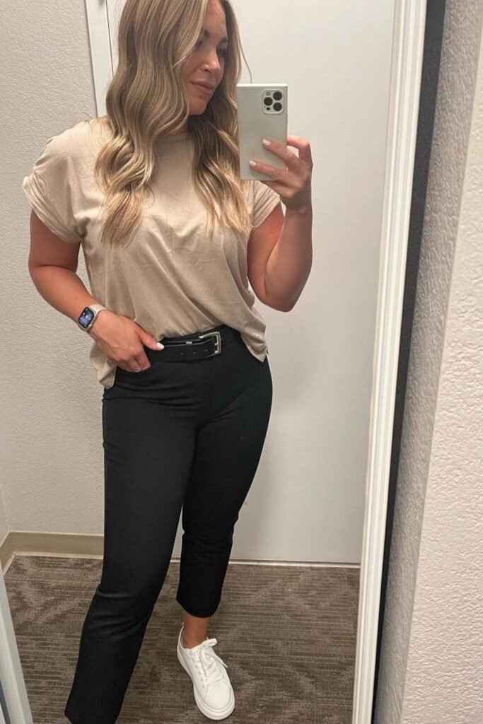 A Slouchy Tee Tucked Into Cropped Black Trousers