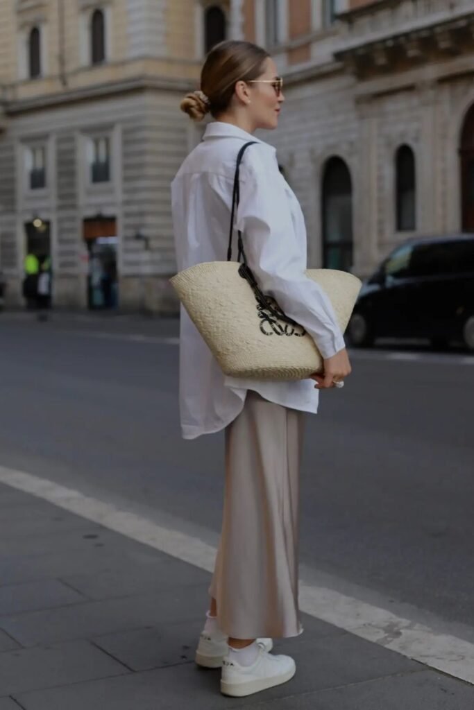 A Stone Satin Skirt With an Oversized White Shirt and Sneakers