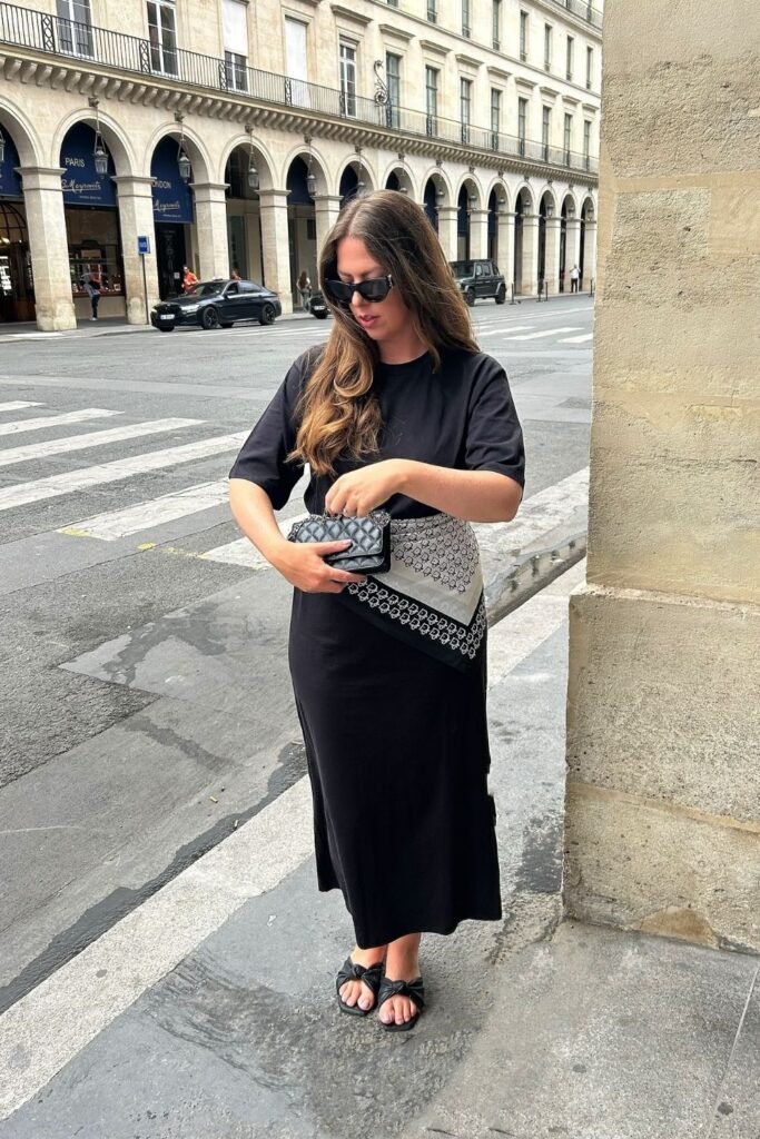 All-Black Tee and Midi Skirt With a Scarf at the Waist