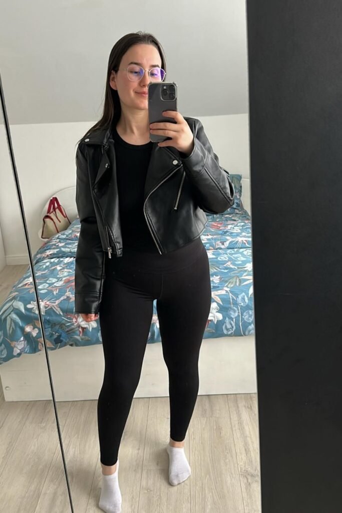 Black Moto Jacket With Simple Leggings and a Clean Black Top