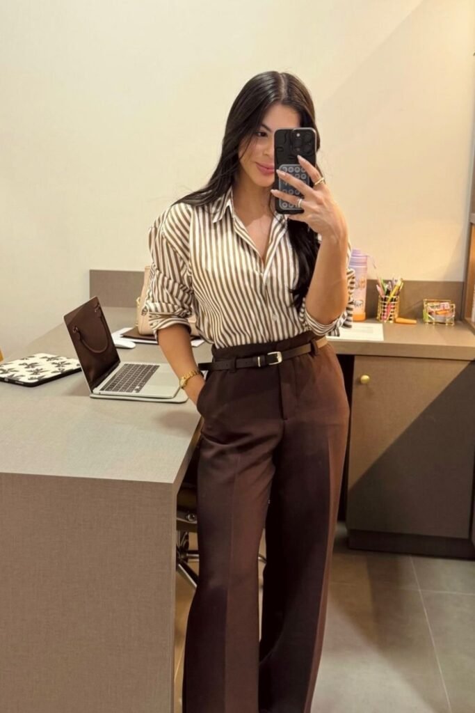 Brown and White Striped Shirt Tucked Into Dark Brown Trousers
