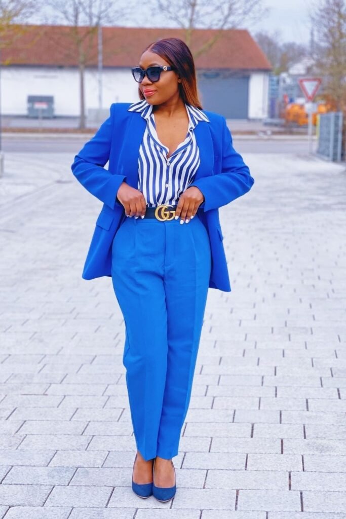 Cobalt Suit With a Striped Shirt and a Gold Belt