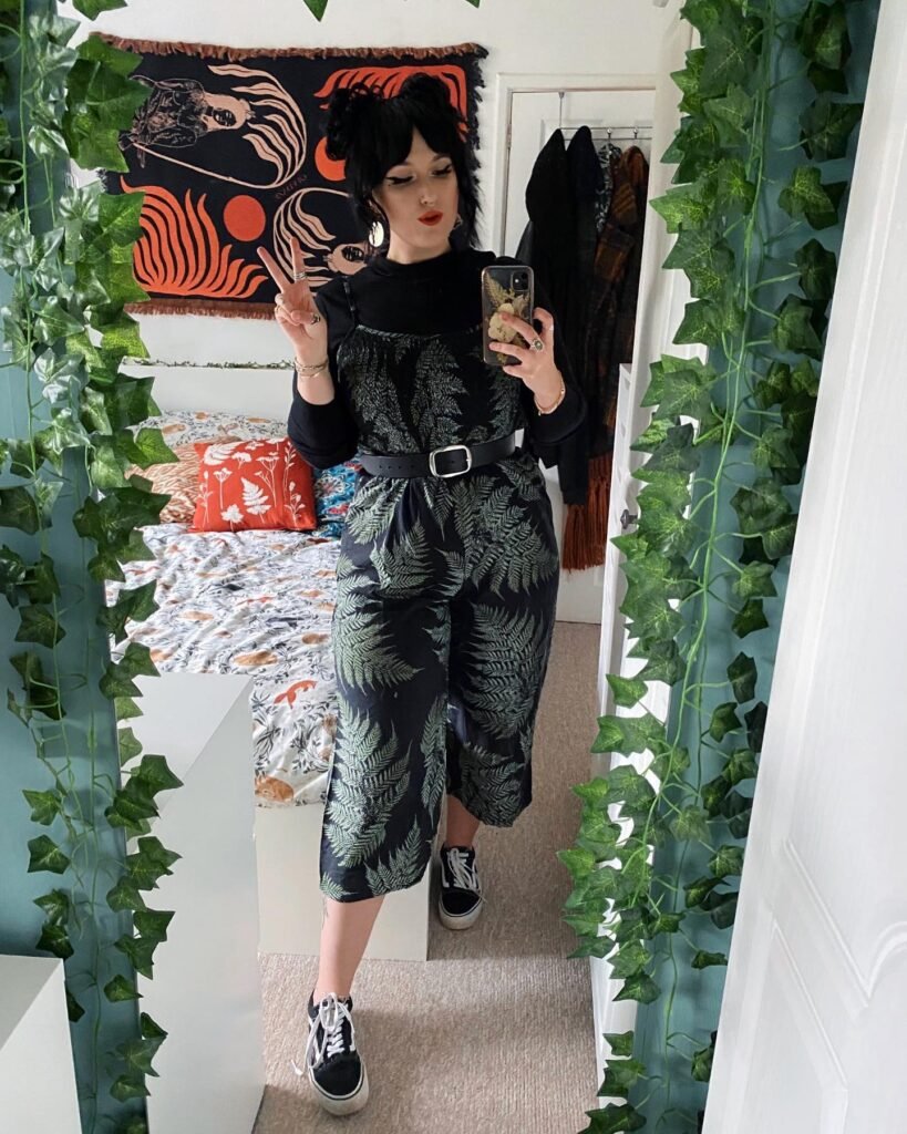 Fern-Print Jumpsuit Over a Black Long-Sleeve Top
