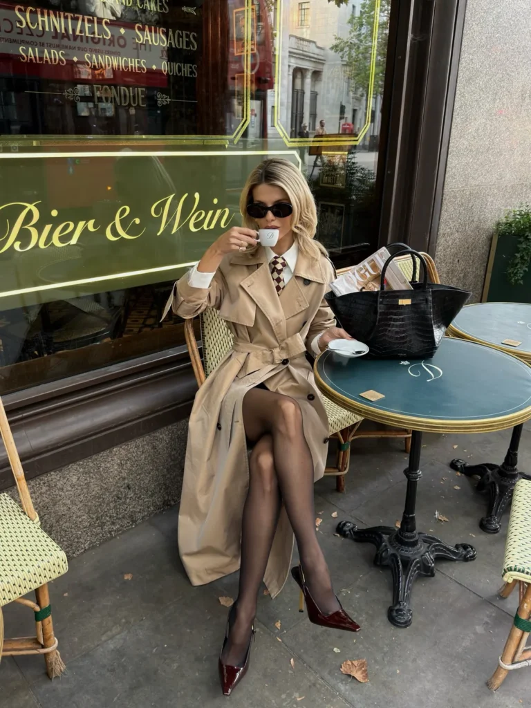 Beige Trench With a Checkered Tie and Burgundy Slingbacks