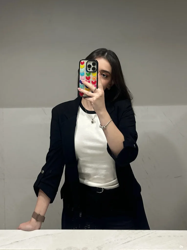 Black Blazer With Roll-Tab Sleeves and a Contrast-Trim Tee