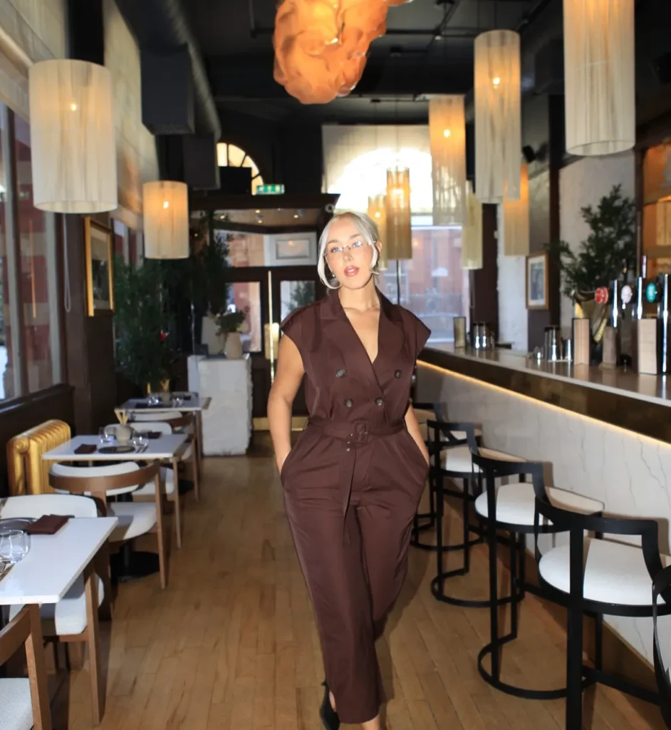 The Brown Belted Jumpsuit With a Trench Collar
