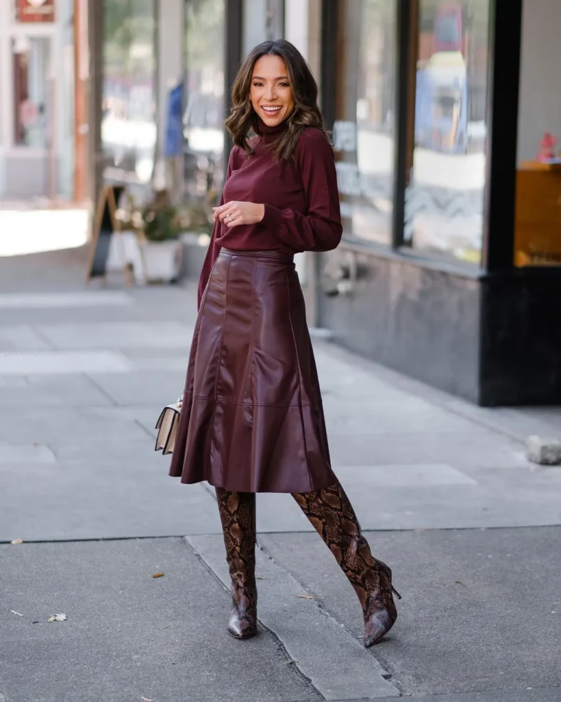 Burgundy Turtleneck, Faux Leather Midi, and Snake Print Boots
