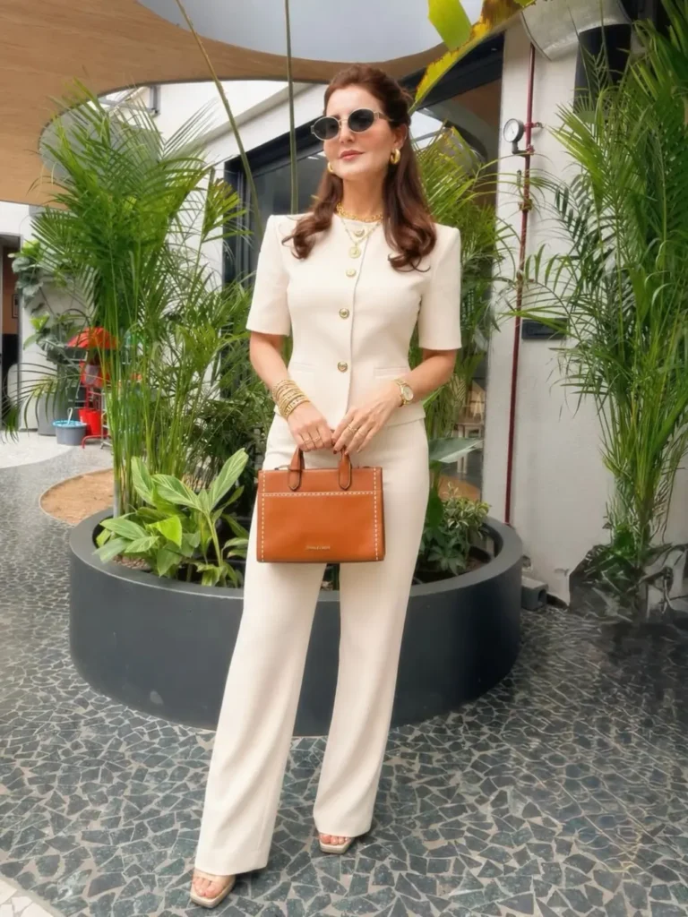 A Cream Short-Sleeve Suit With Gold Buttons