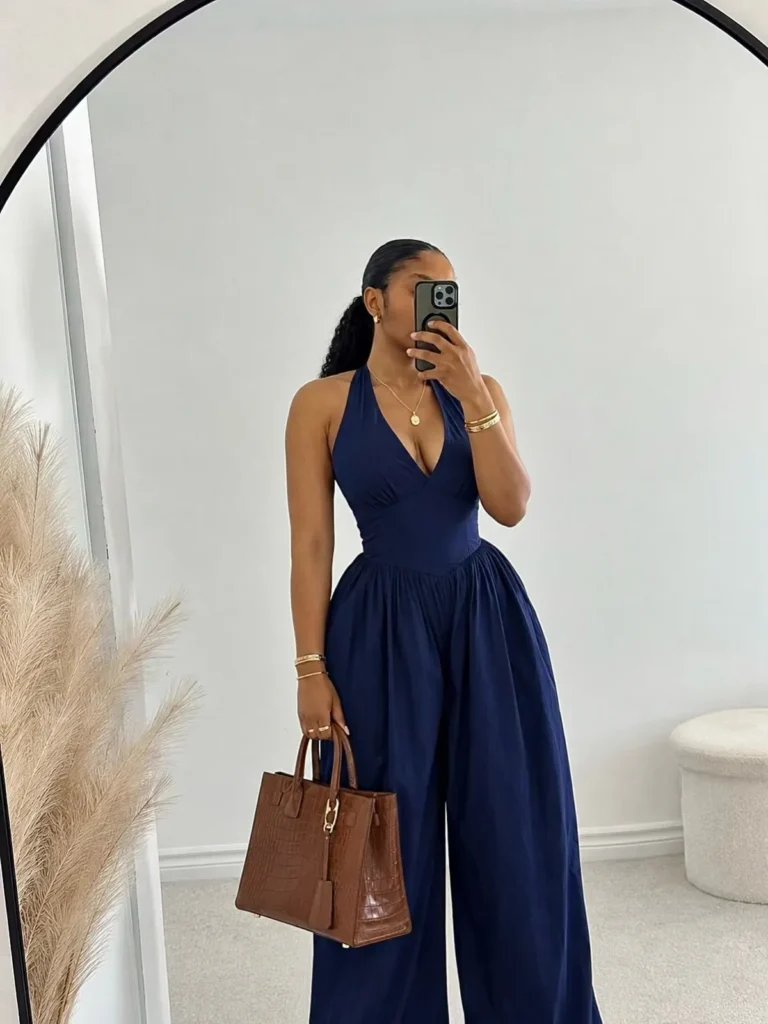 Navy Halter Jumpsuit With a Brown Croc Tote