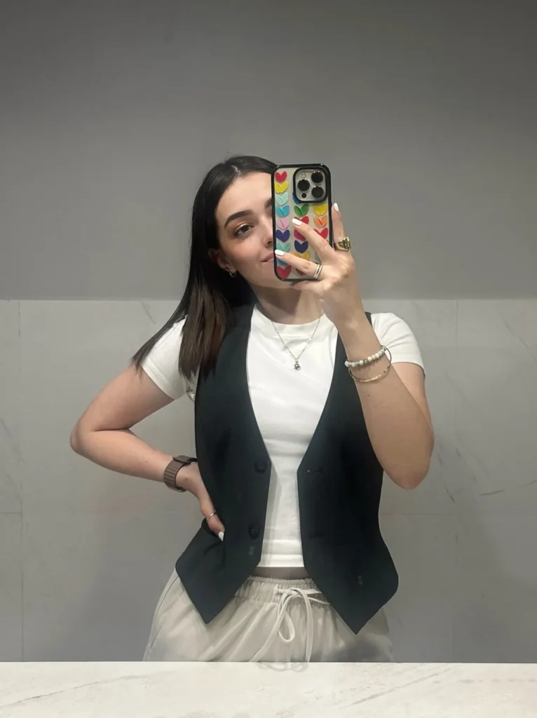 White Tee, Black Waistcoat, and Cream Drawstring Pants