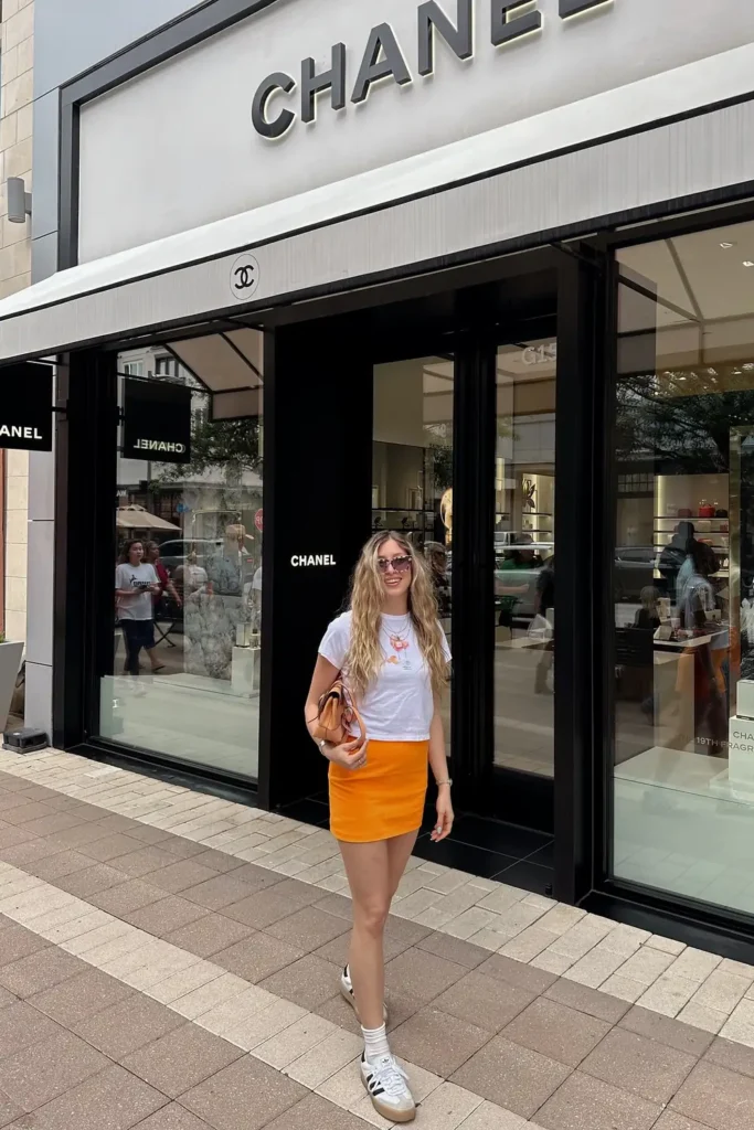 Orange Mini Skirt, Baby Tee, and Retro Sneakers