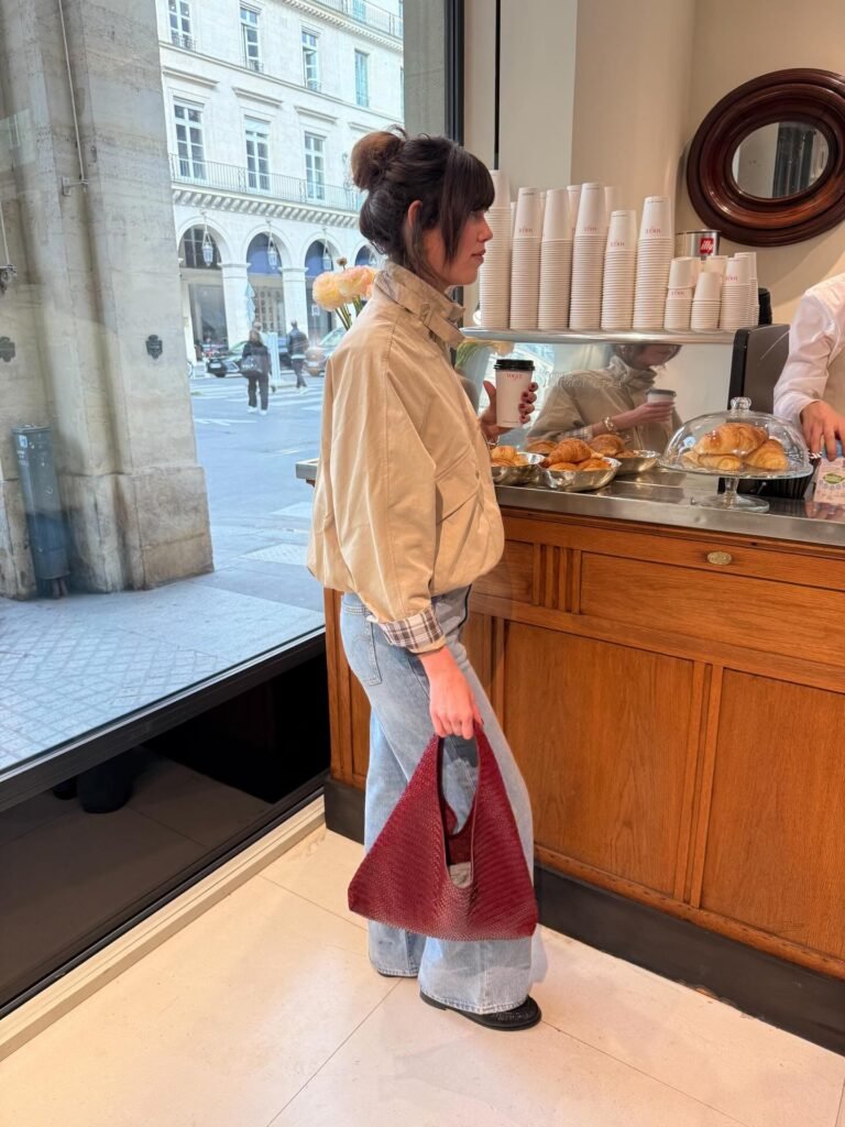 Cream Bomber, Wide Denim, and One Bold Red Bag