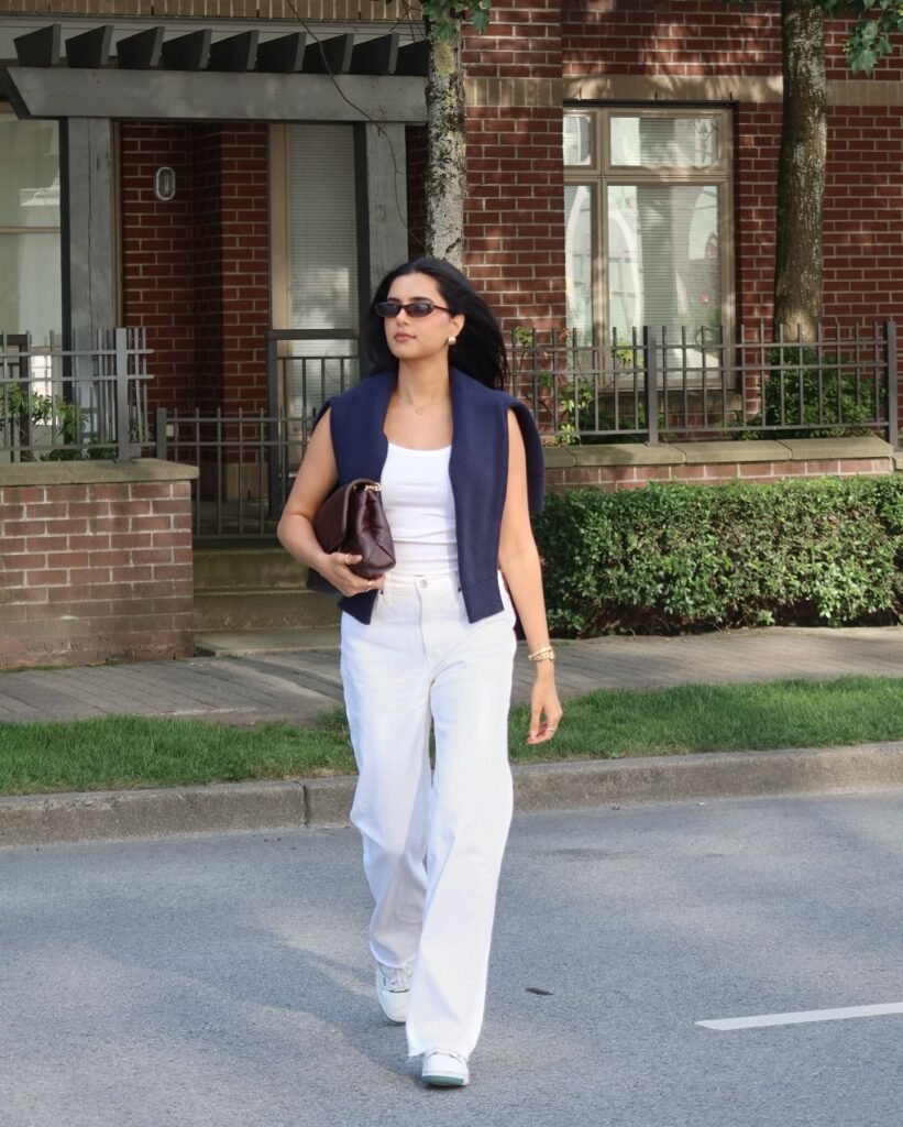 Drape a Navy Sweater Over an All-White Outfit