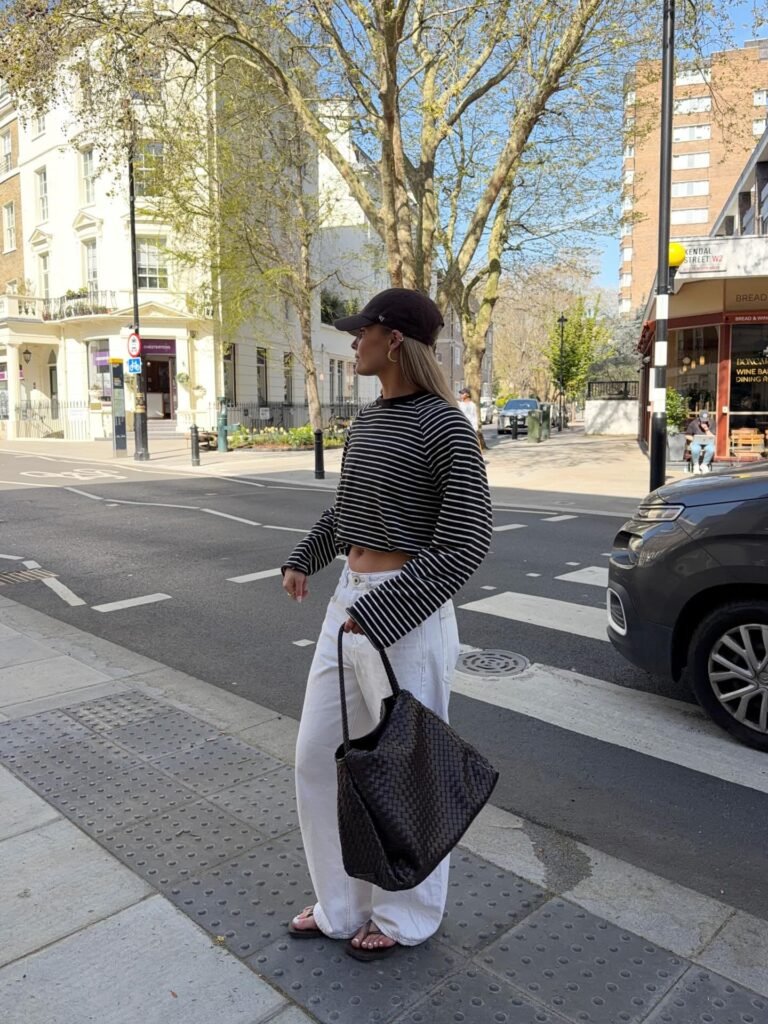 Keep Baggy White Jeans Casual With Black Stripes