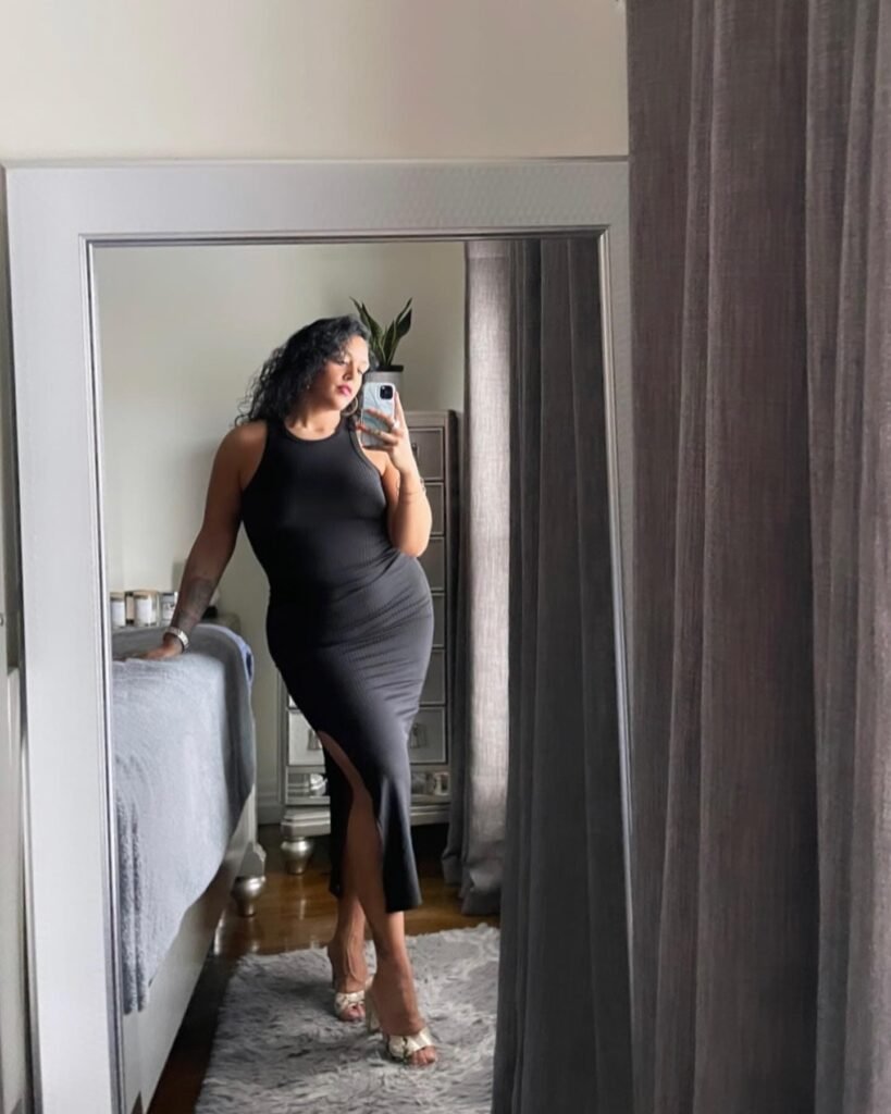 Keep It Sleek in a Black Ribbed Bodycon Midi Dress