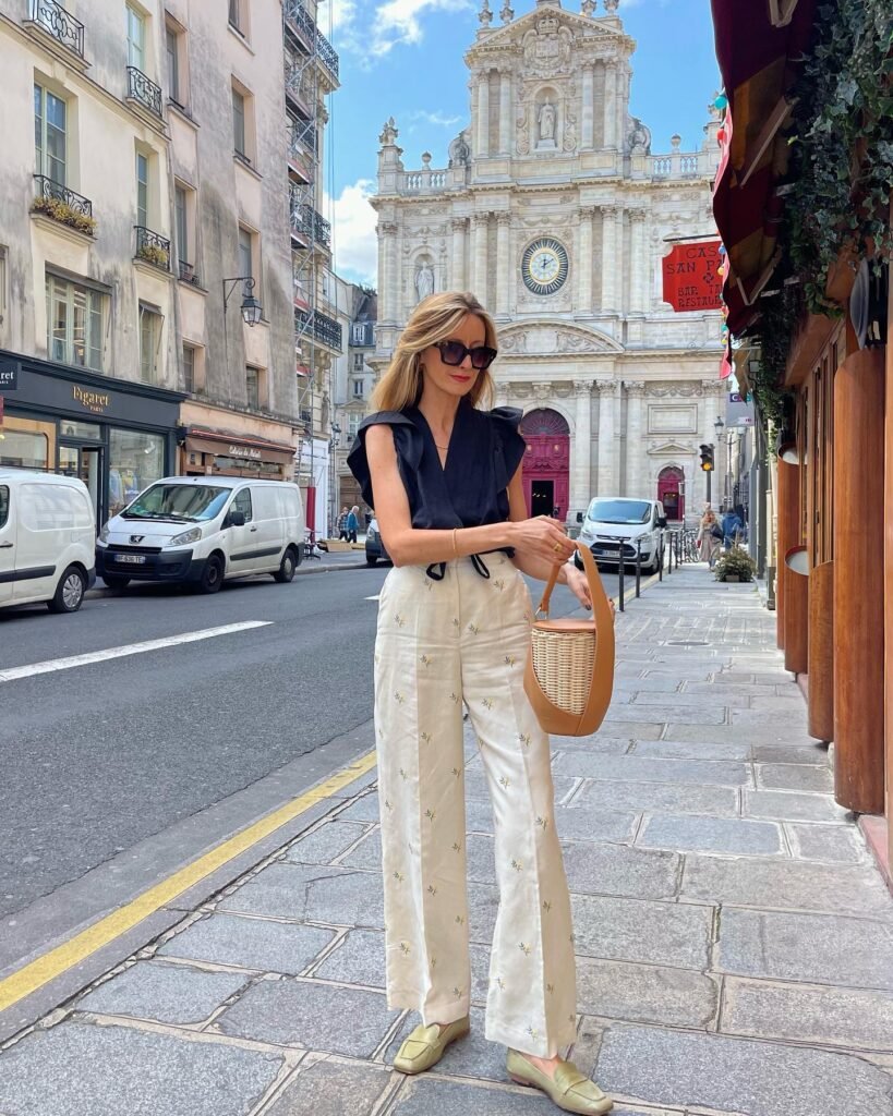Navy Ruffle Blouse With Embroidered Cream Trousers_andreaa