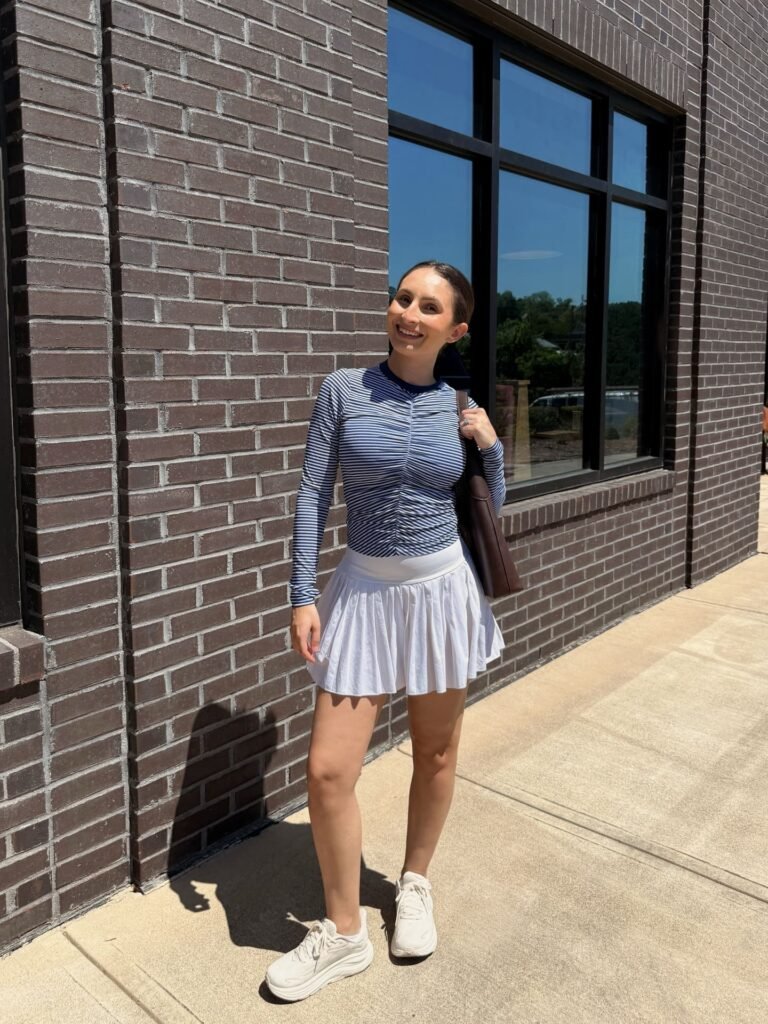 Striped Long-Sleeve Top With a Pleated Tennis Skirt