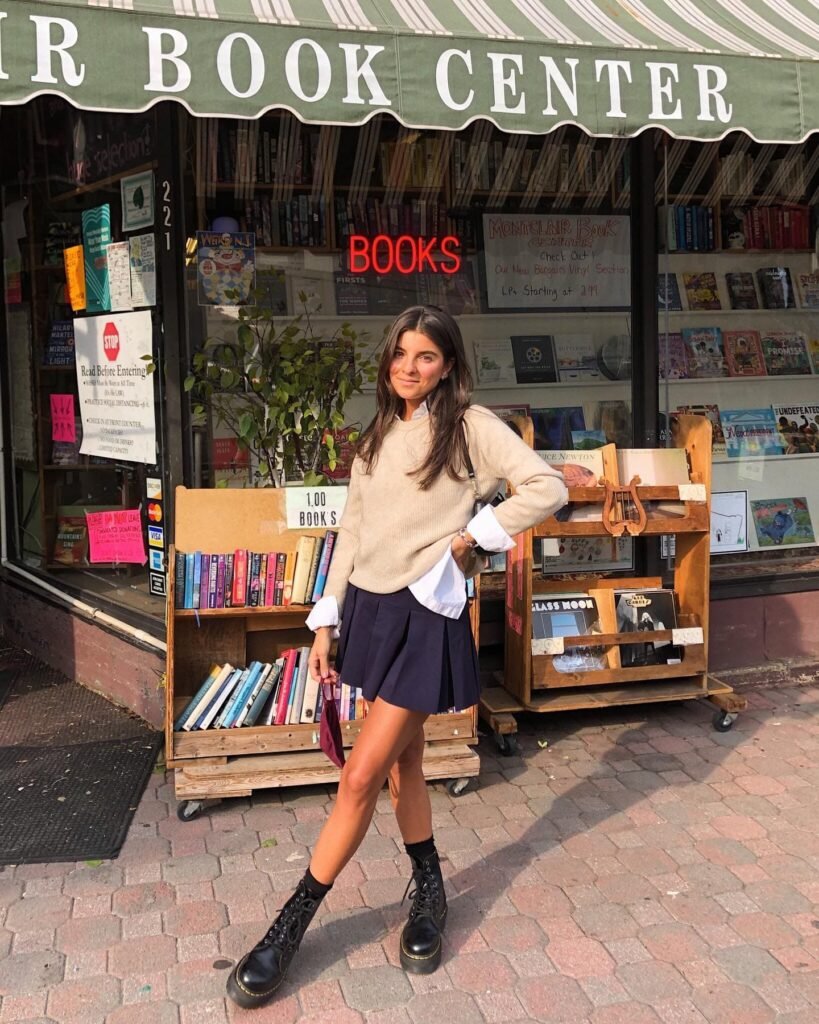 Beige Sweater, Pleated Skirt, and Combat Boots