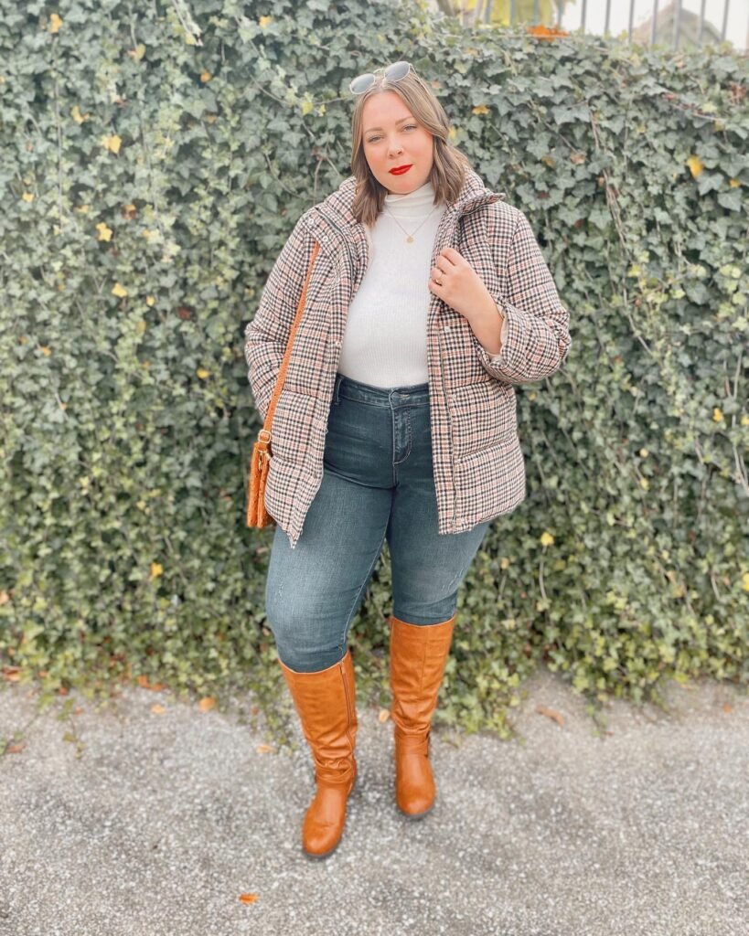 Checked Puffer Jacket With a White Turtleneck and Tan Boots