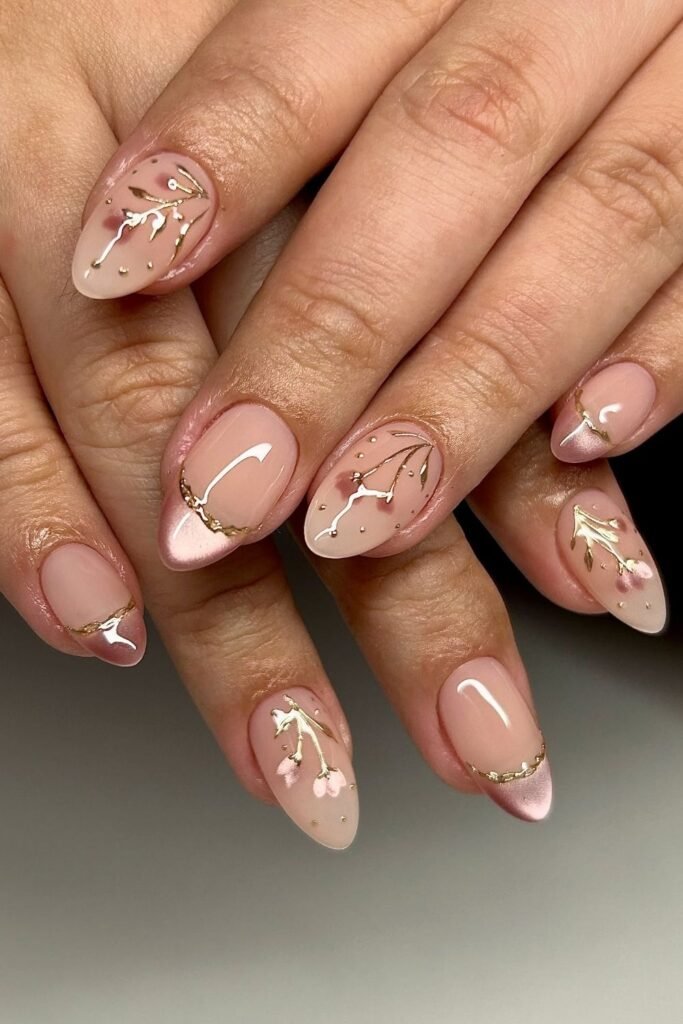Cherry Blossom Nails with Gold Branches on a Sheer Pink Base