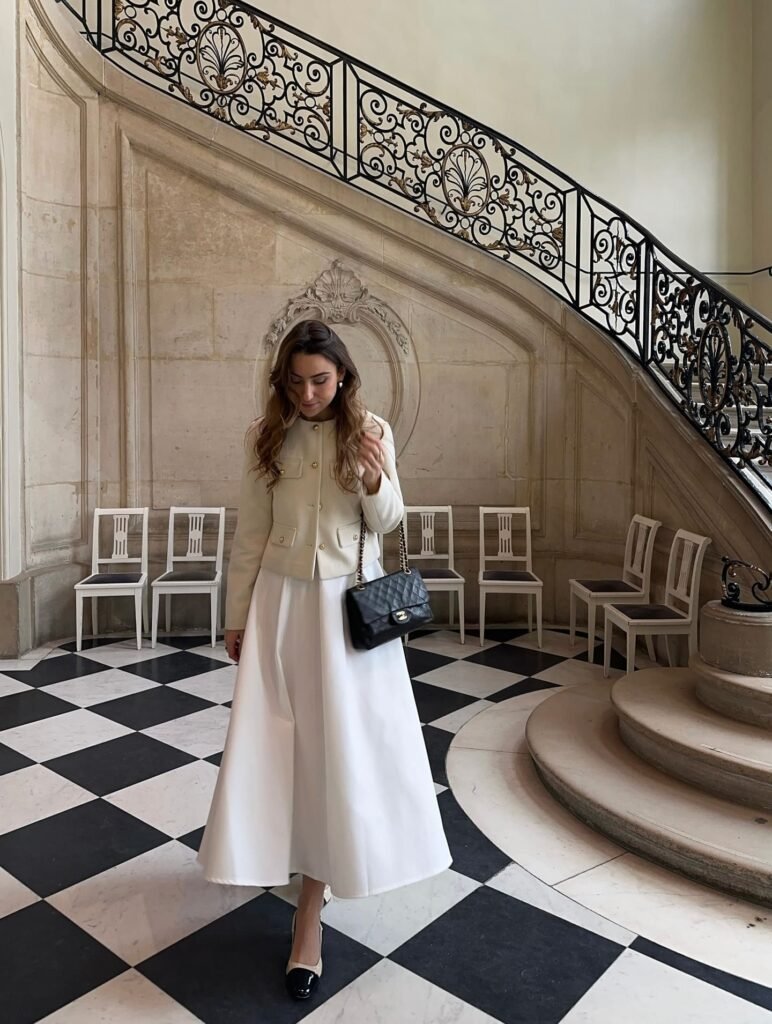 Cream Cropped Jacket With a Flowing White Midi Skirt