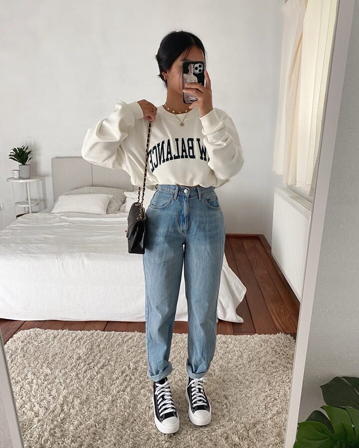 Graphic Sweatshirt With Cuffed Mom Jeans and High Tops