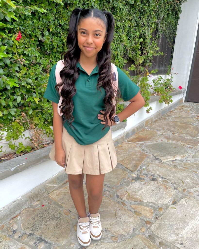 Green Polo and Neutral Pleated Skirt