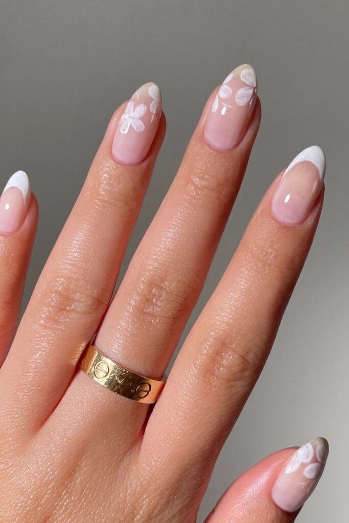 Milky Pink French Nails With White Floral Art