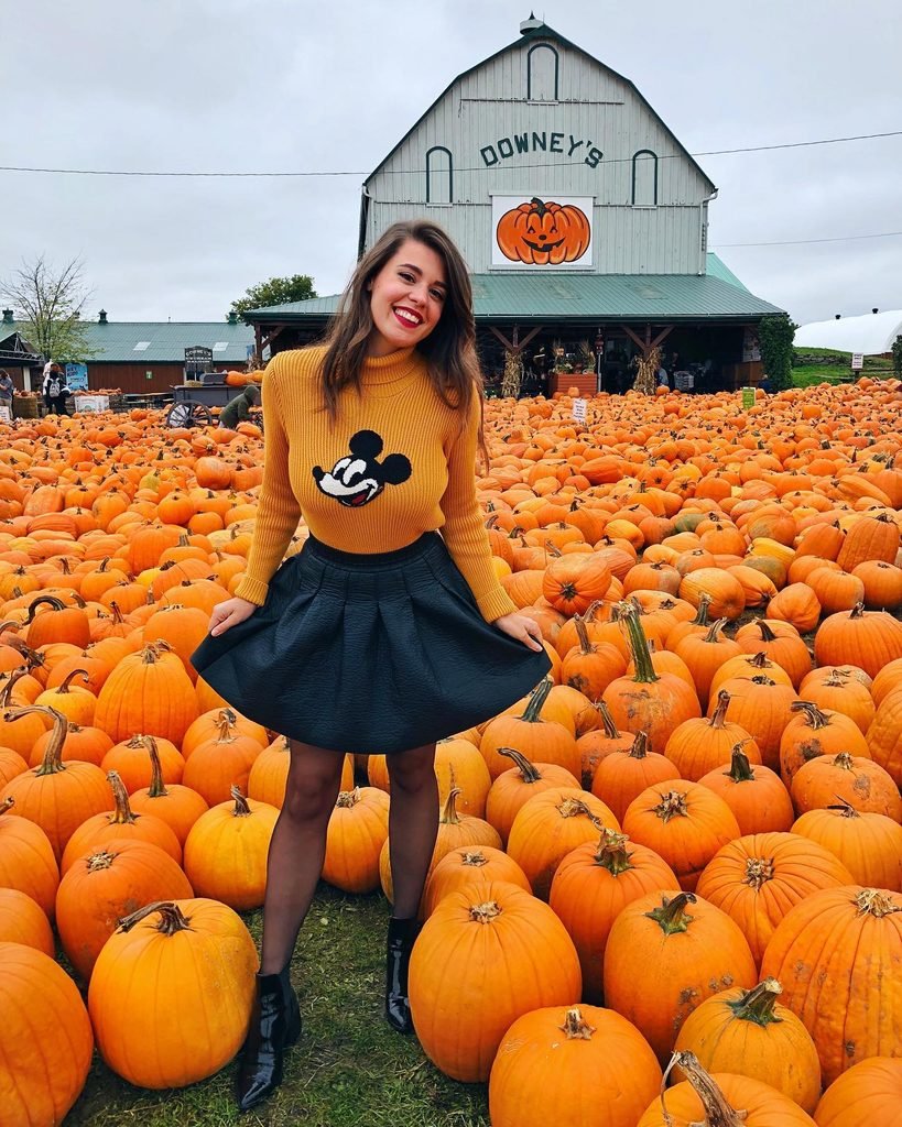 Mustard Turtleneck With a Black Faux Leather Skater Skirt