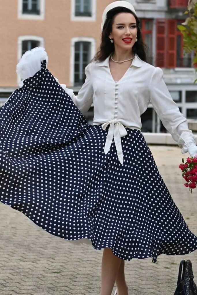 Navy Polka Dot Skirt With a Tie Front Ivory Blouse