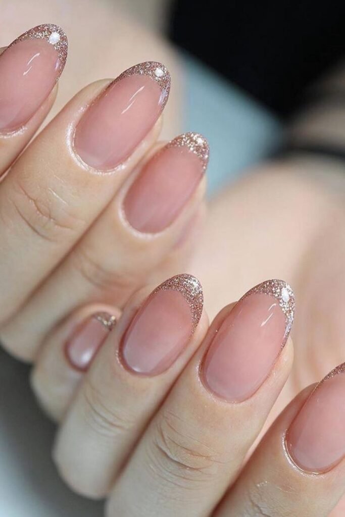 Rose Gold Glitter French Tips on Sheer Pink Nails