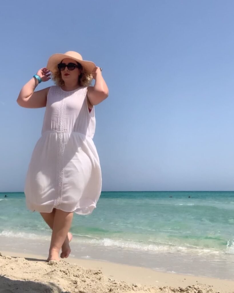 Simple White Cotton Sundress With A Straw Hat